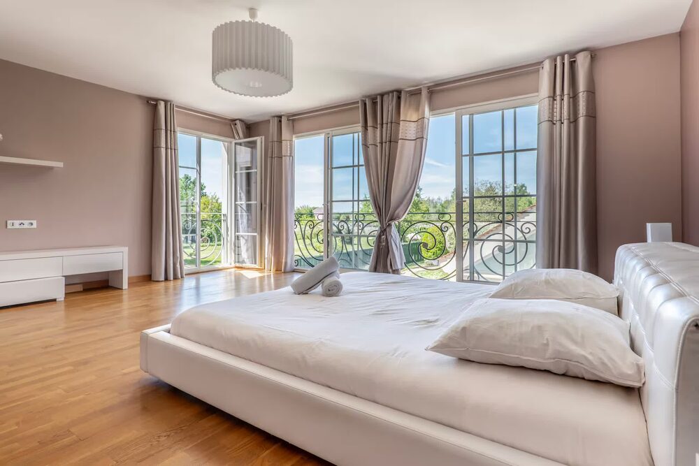 Chambre king size de la Maison de Prestige